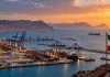 Berbera’s Strategic Role in Red Sea Security: Israeli Analysis Proposes New Saudi Partnership With Somaliland Port of Berbera in Somaliland at sunset, featuring cargo ships, container cranes and the Somaliland flag, illustrating the port’s strategic importance to Red Sea maritime security.